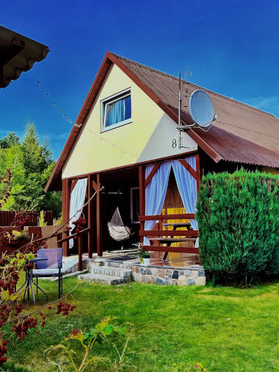 Zdjęcie domku za dnia 5